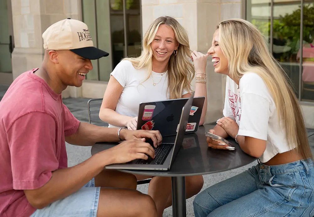 group of young adults studying